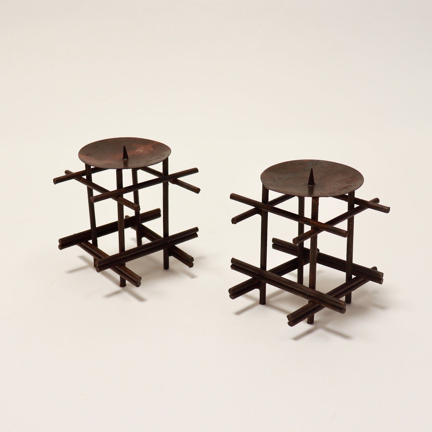 Brutalist candlesticks with beeswax patina