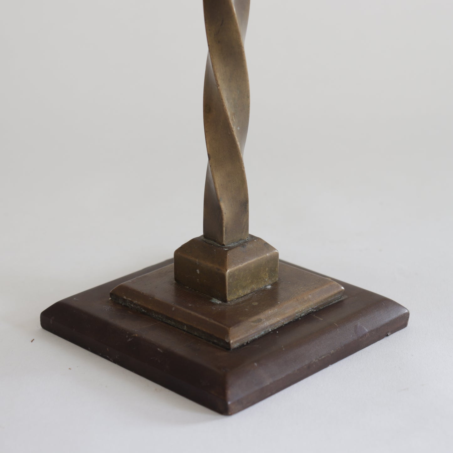 Heavy twisted bronze candlestick