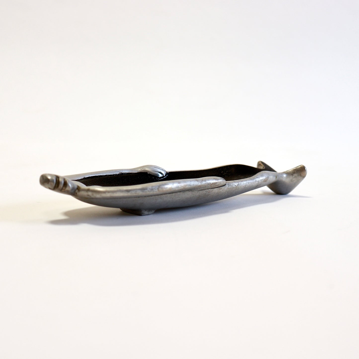 modernist pewter object