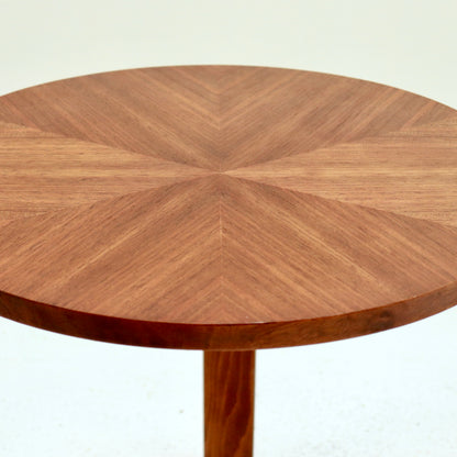 Close up of starburst veneer on vintage round table