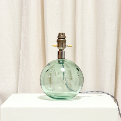 Vintage green glass ball lamp with hand cut dimple details
