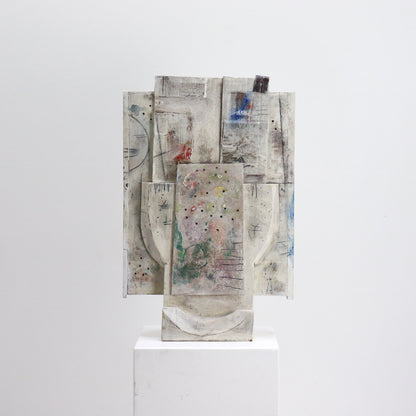 Mixed media relief artwork with carved wooden forms