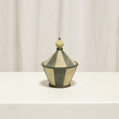 Small striped studio pottery lidded pot with conical lid and finial.