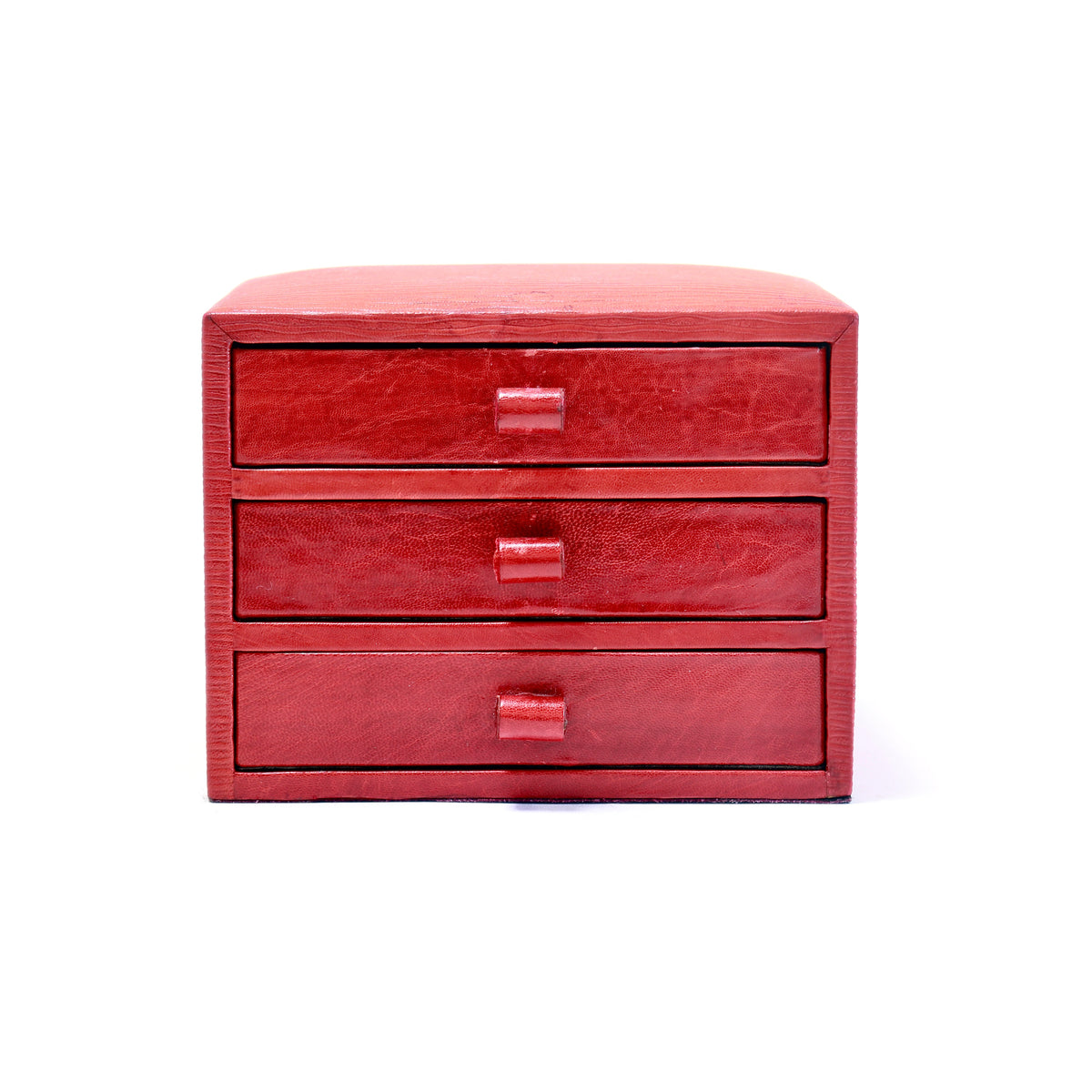 Red leather tabletop jewellery box with three drawers, front view