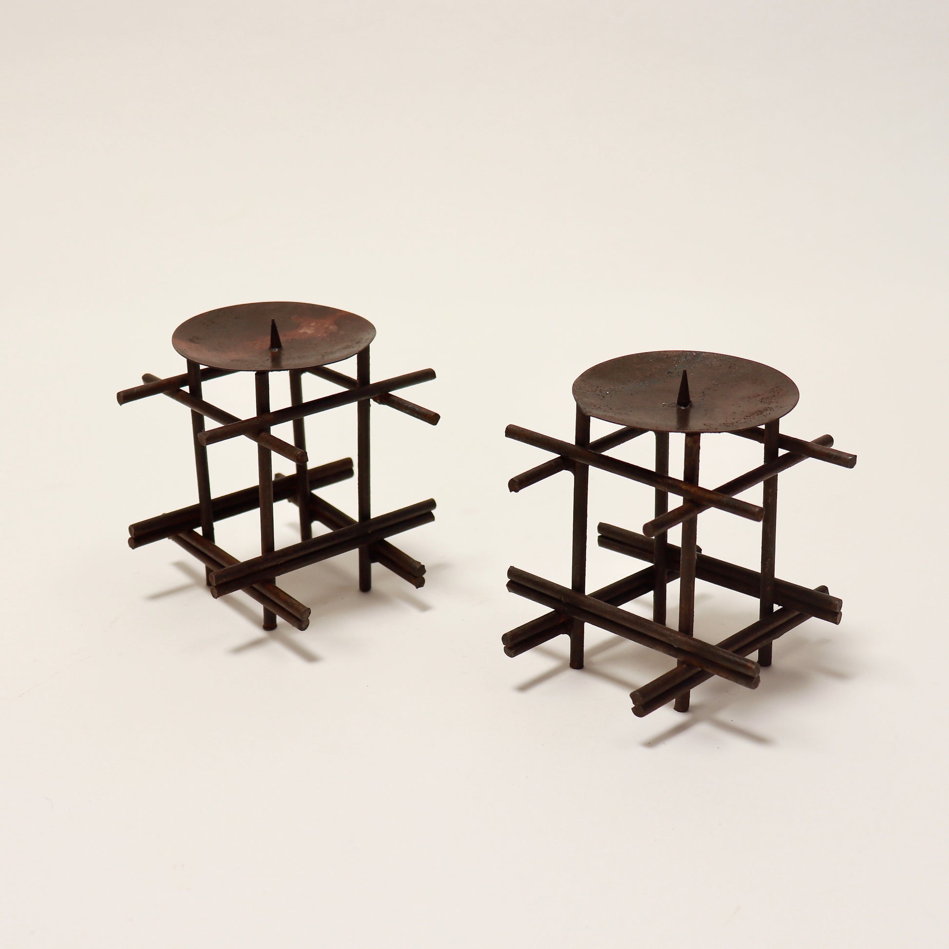 Brutalist candlesticks with beeswax patina