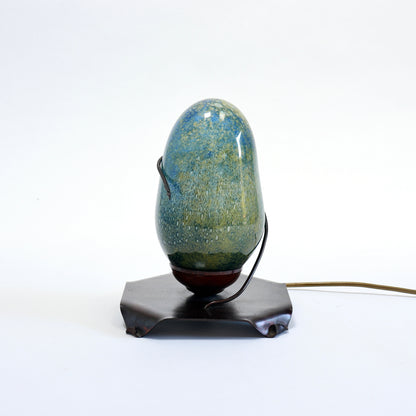 Vintage bubble glass table lamp with blue-green shade and folded copper base