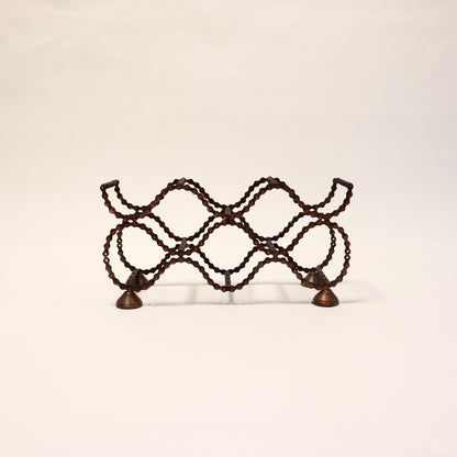 Vintage folk art bicycle chain wine rack with industrial character