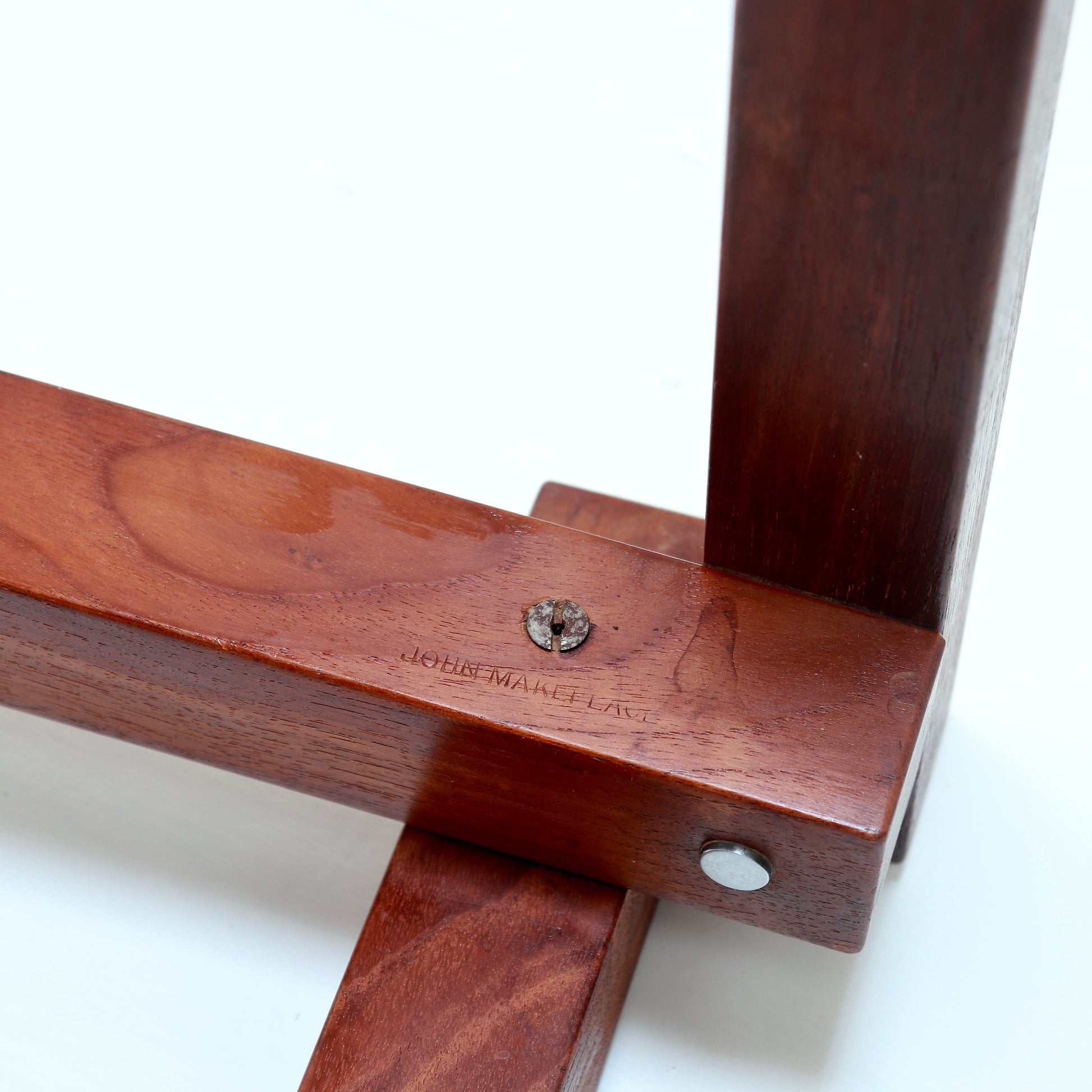 Maker's stamp to underside of John Makepeace table