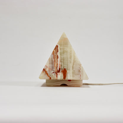 Decorative onyx lamp in geometric pyramid form