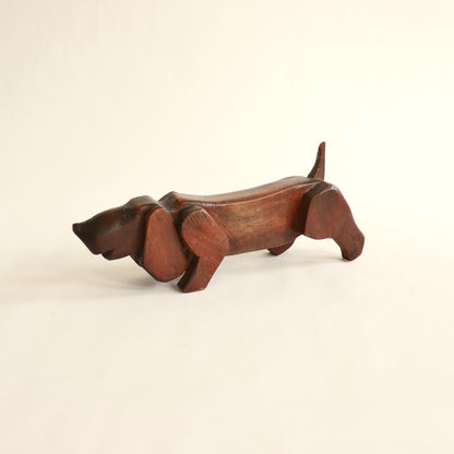 Mid century wooden dog carving elongated form

