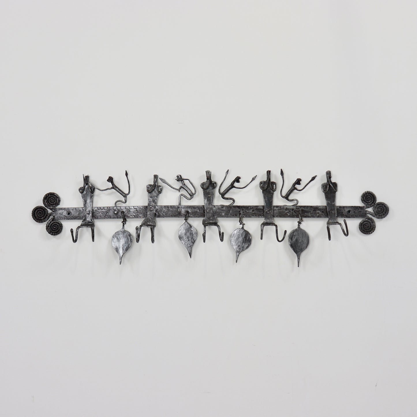 Vintage wrought iron coat hooks with figures