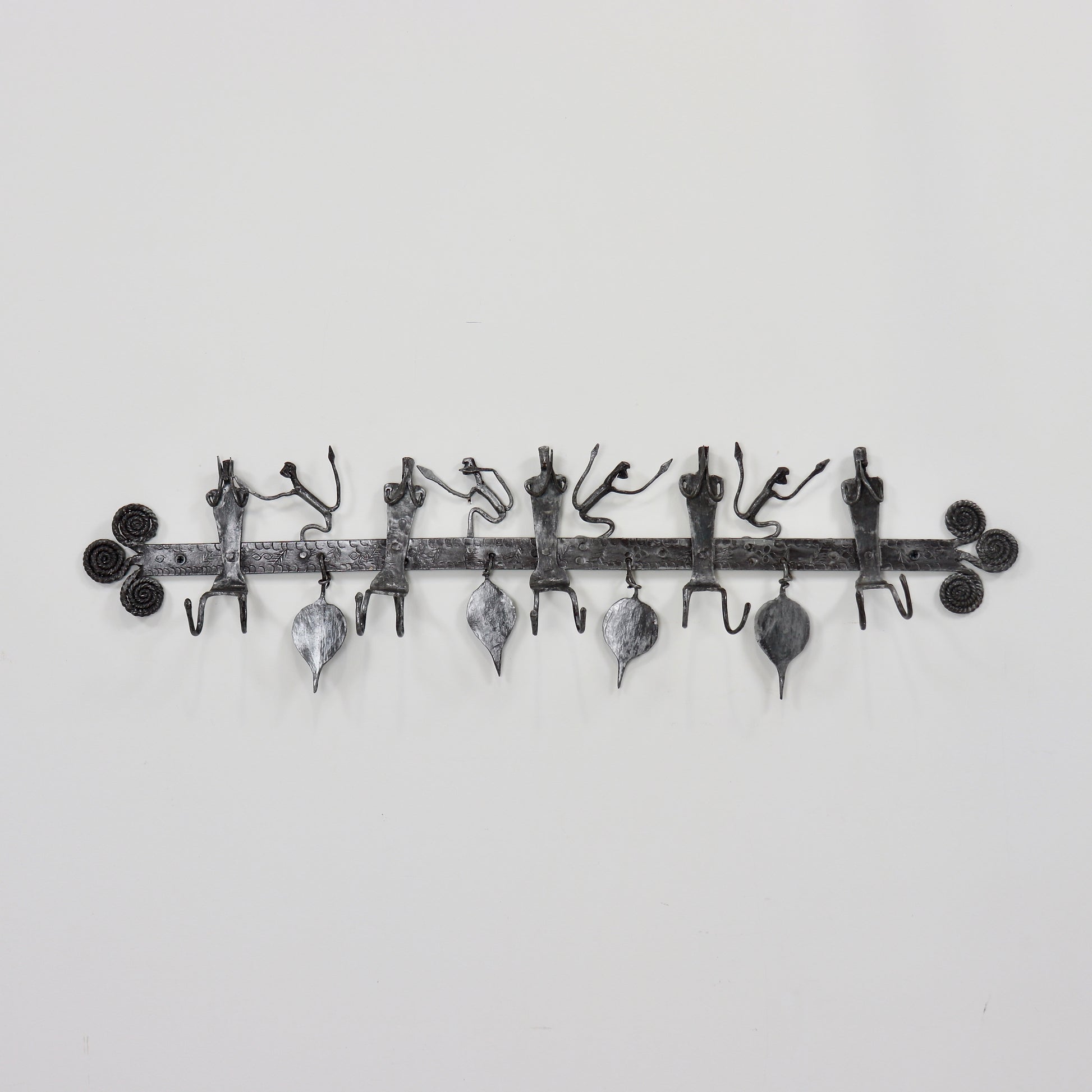 Vintage wrought iron coat hooks with figures