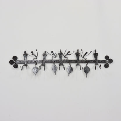 Vintage wrought iron coat hooks with figures