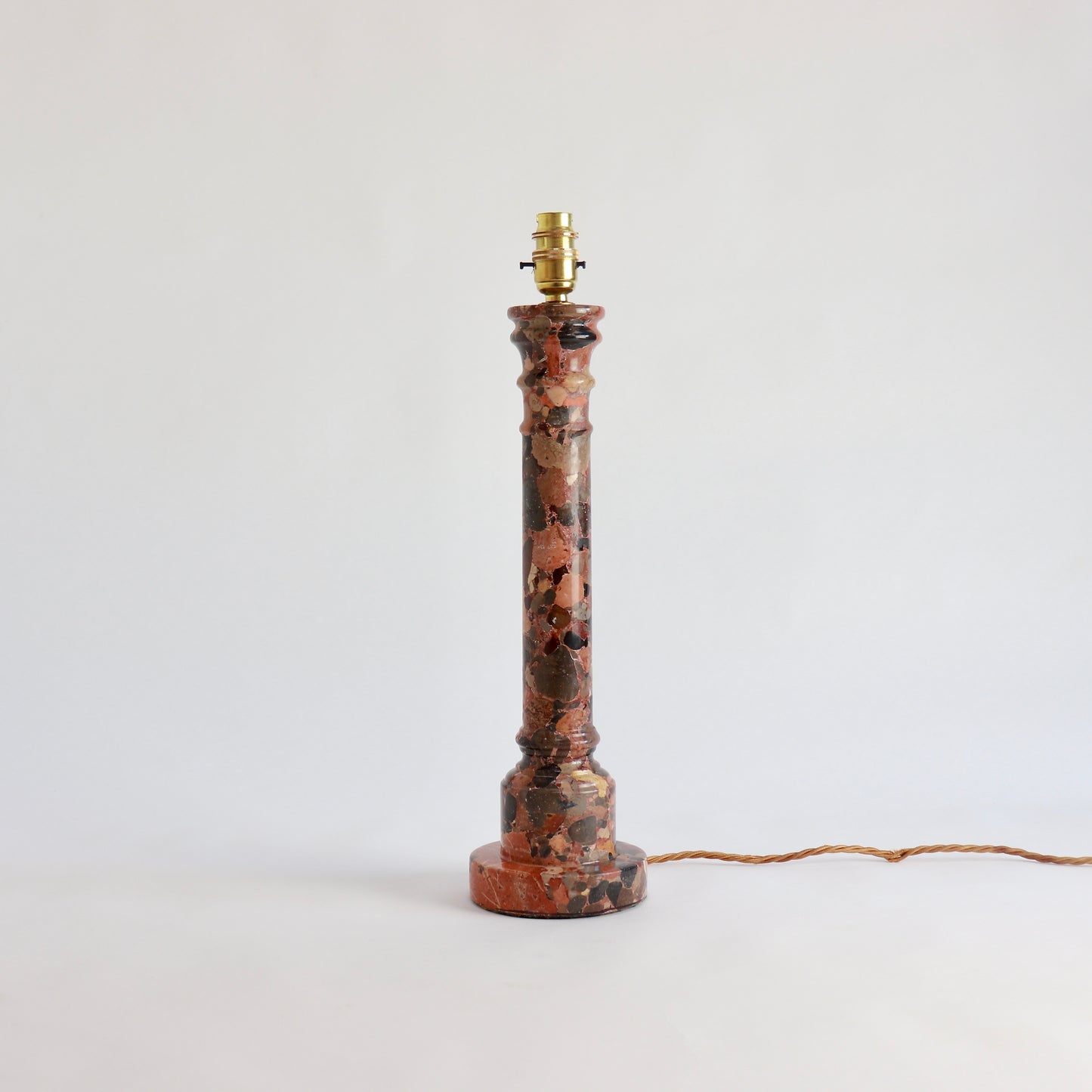 Brèche d’Alep marble lamp column showing red and black stone fragments