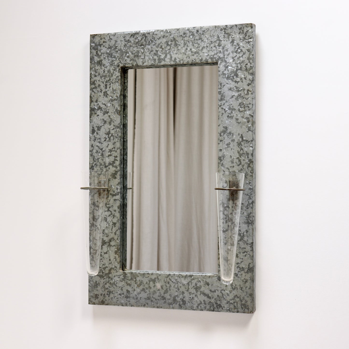 Galvanised steel mirror with twin glass wall vases
