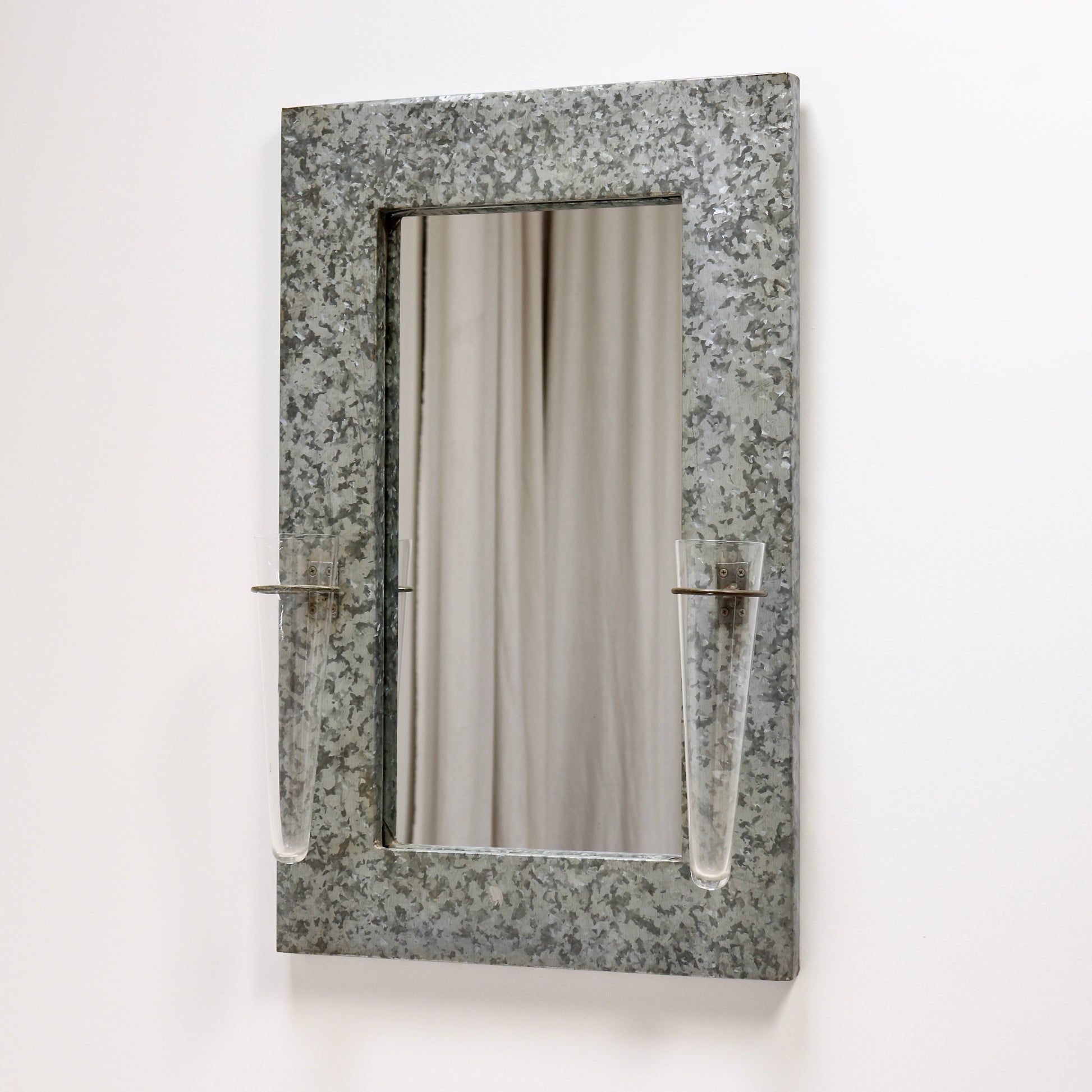 Galvanised steel mirror with twin glass wall vases
