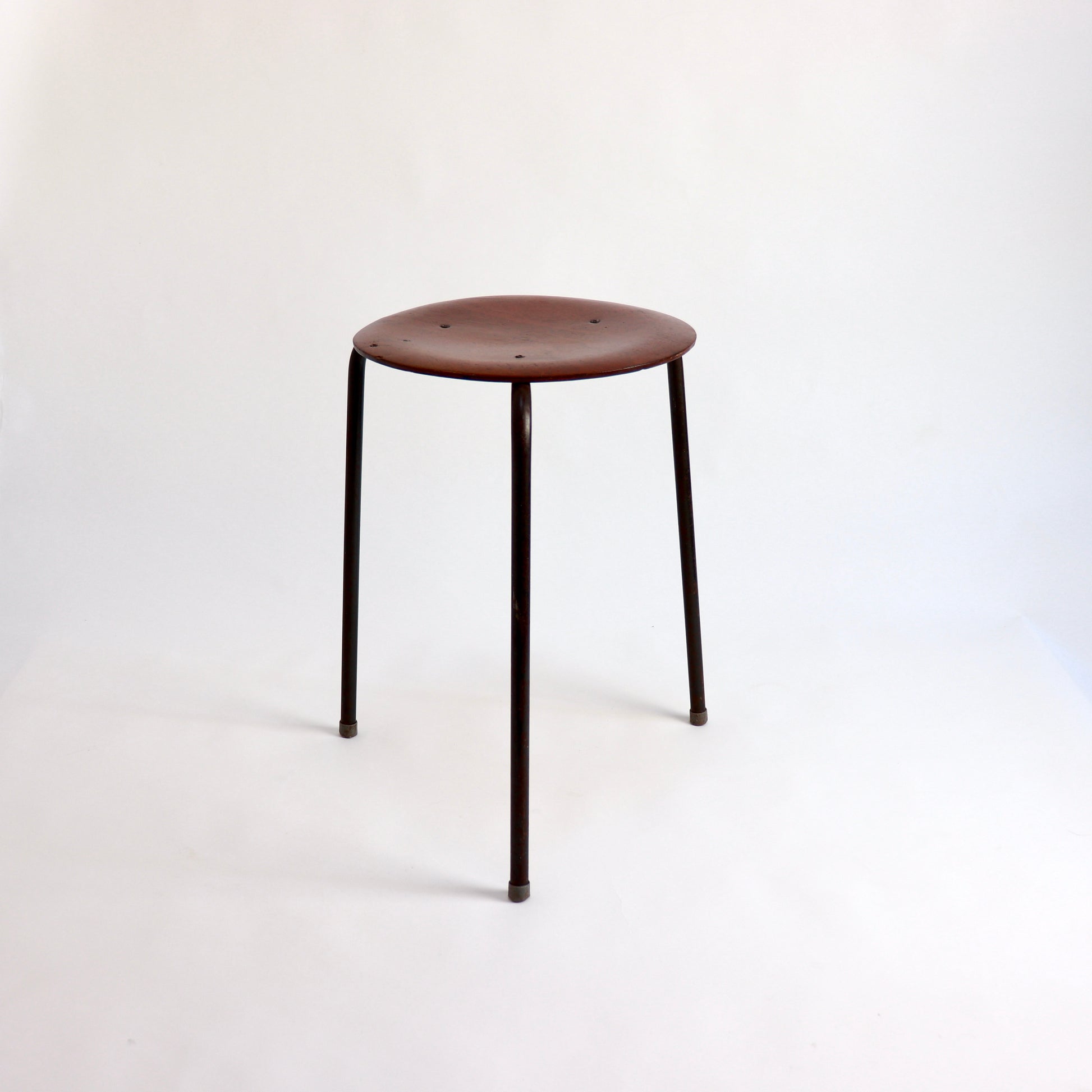 Minimalist vintage stool with circular seat and metal legs