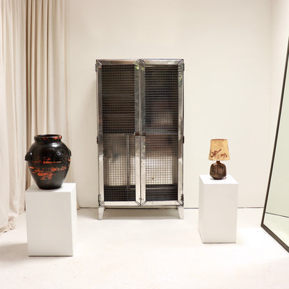 Mid century ex naval aluminium storage cabinet with steel mesh doors.