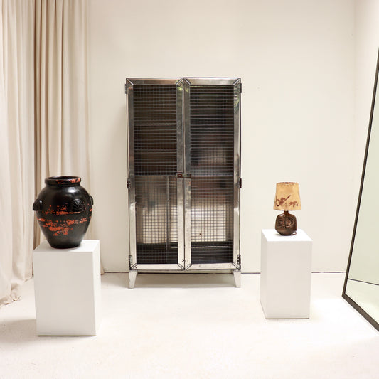 Mid century ex naval aluminium storage cabinet with steel mesh doors.