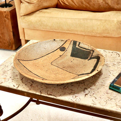 Mid-century studio pottery platter with abstract design