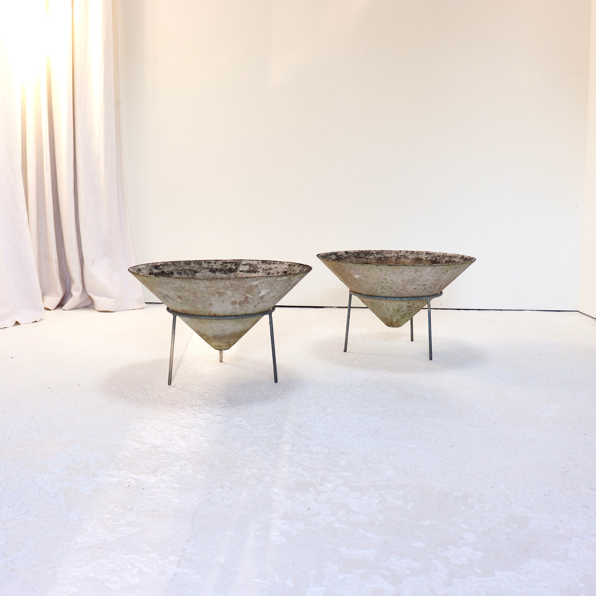 Mid-century modern outdoor planters designed by Willy Guhl