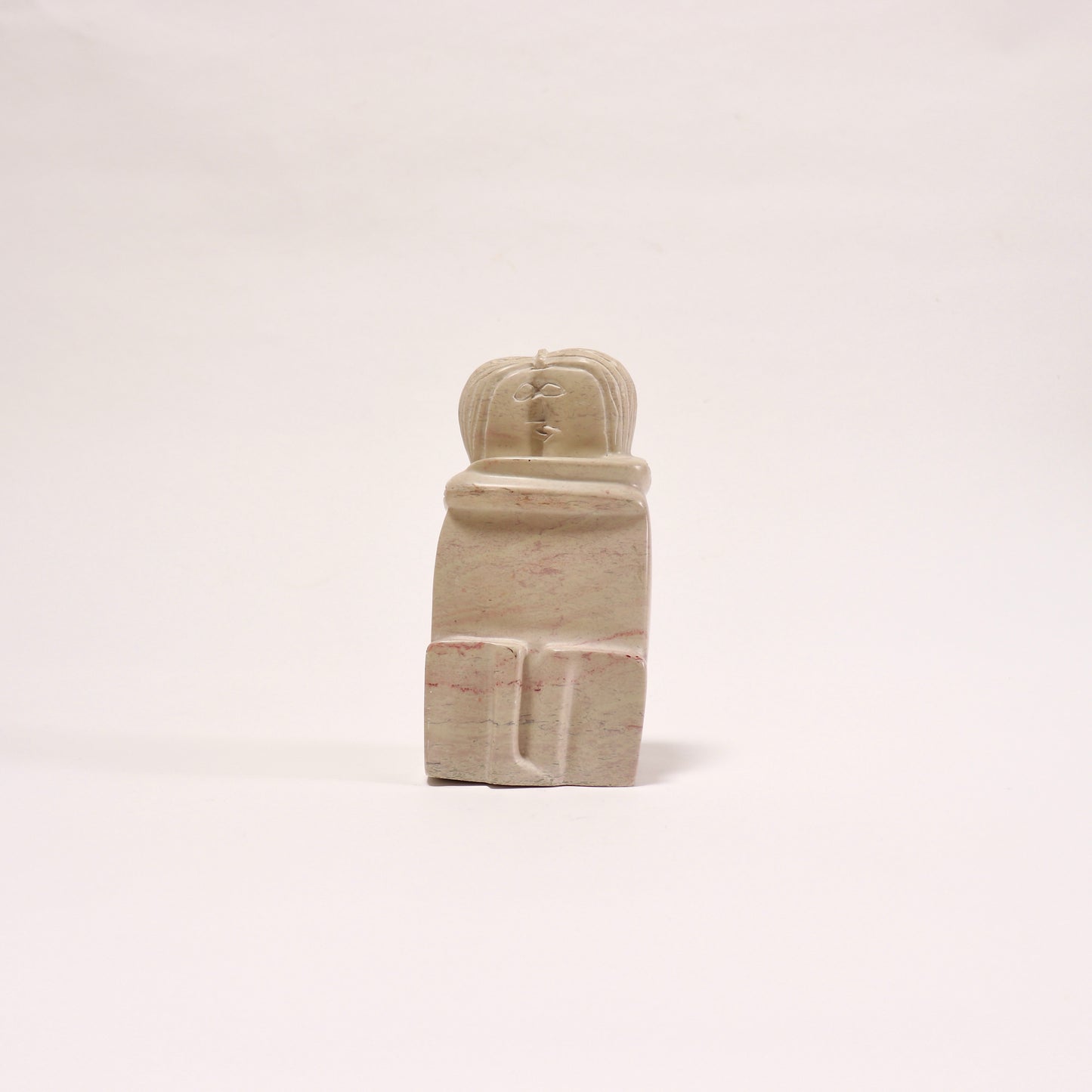Soapstone sculpture after Brancusi's The Kiss front view