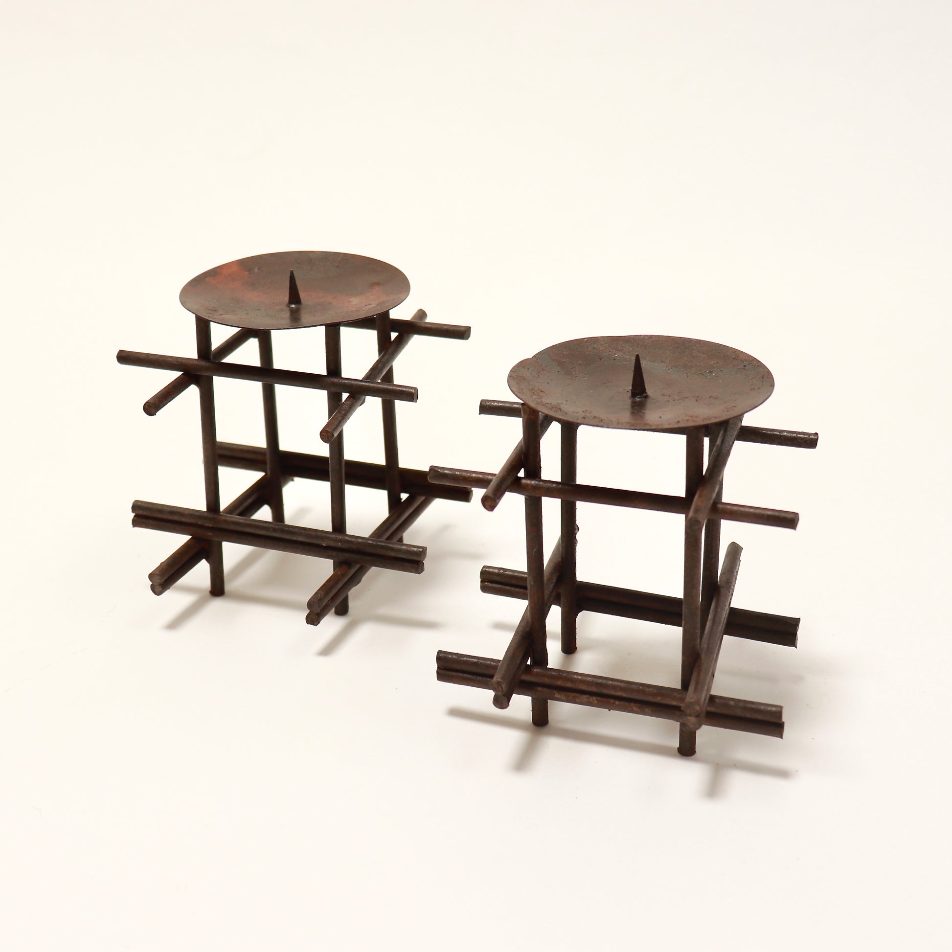 Sculptural geometric steel candle holders
