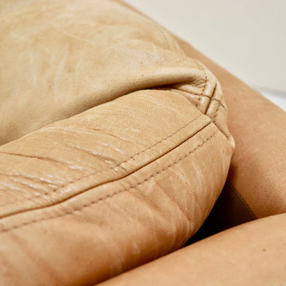 “Backrest leather creasing detail on Model 535.”