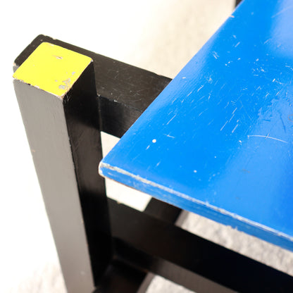 Detail of blue seat and yellow accents.