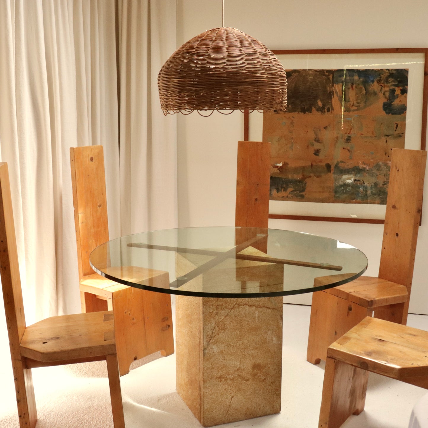 Oversized vintage rattan pendant lamp hanging over table