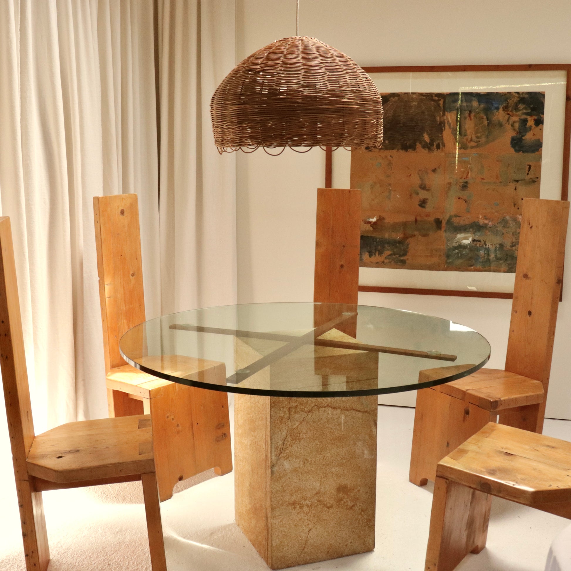 Oversized vintage rattan pendant lamp hanging over table