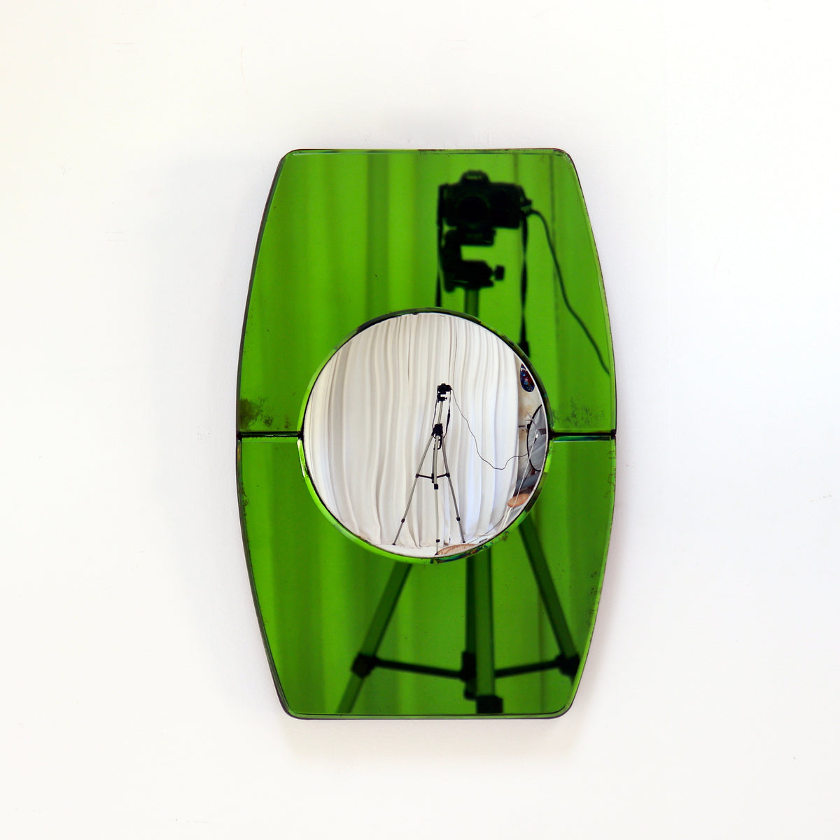 Art Deco wall mirror with green mirrored glass surround and convex circular centre