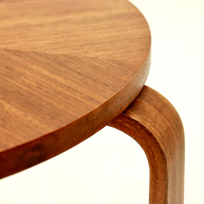 Detail of bent plywood leg meeting tabletop