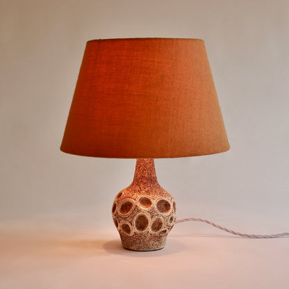 Vintage sculptural lamp base in neutral tones

