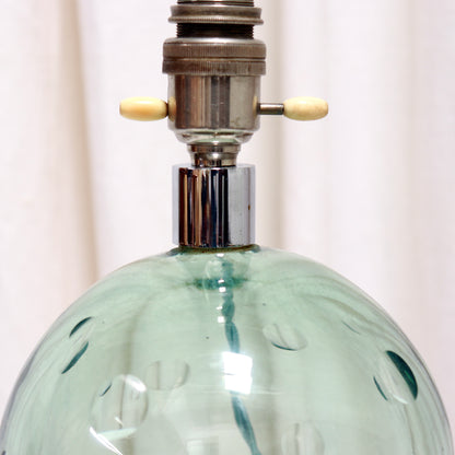 Detail of vintage double bone switch and nickel lamp holder
