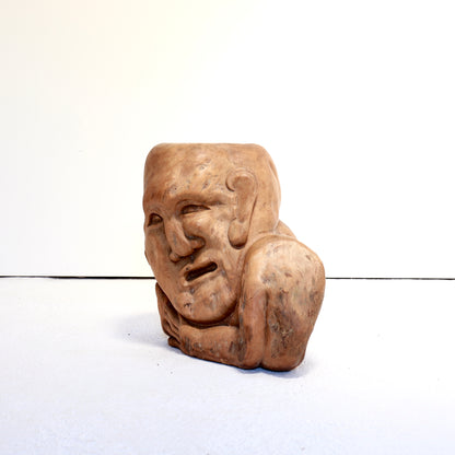 Characterful carved wooden figure with honey patina