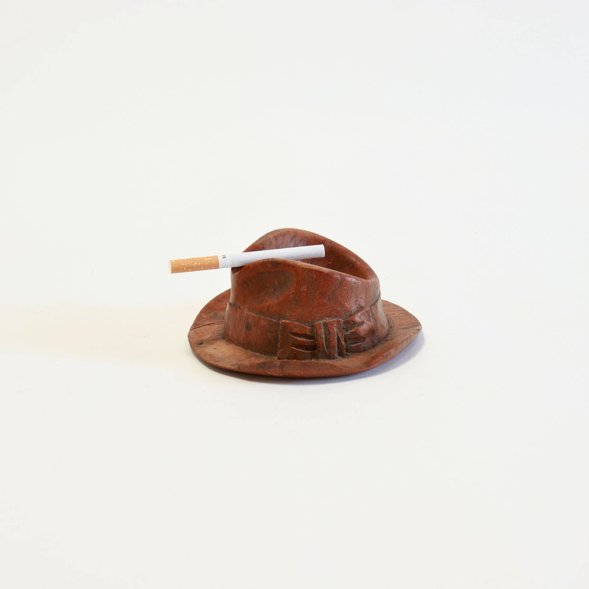 Hand carved wooden fedora hat ashtray.