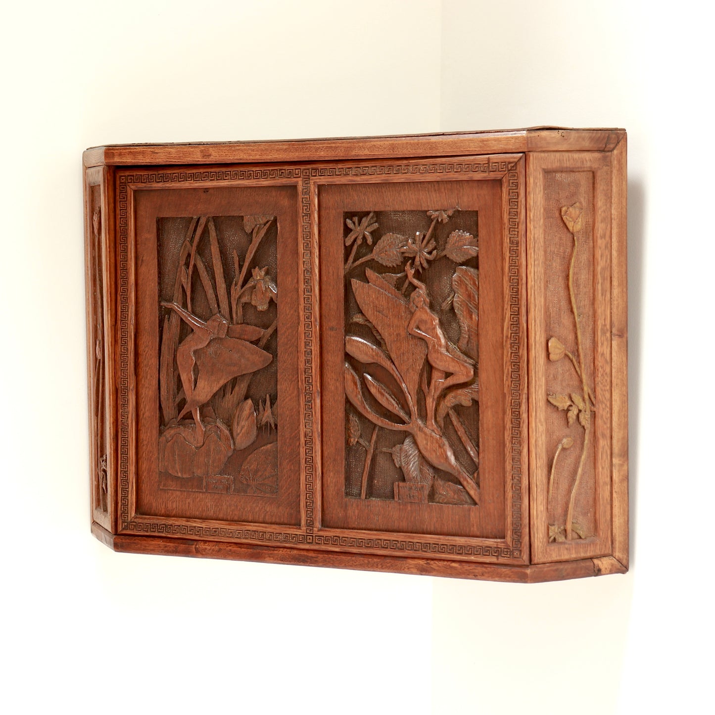 Rustic handmade corner cabinet with Art Nouveau influence