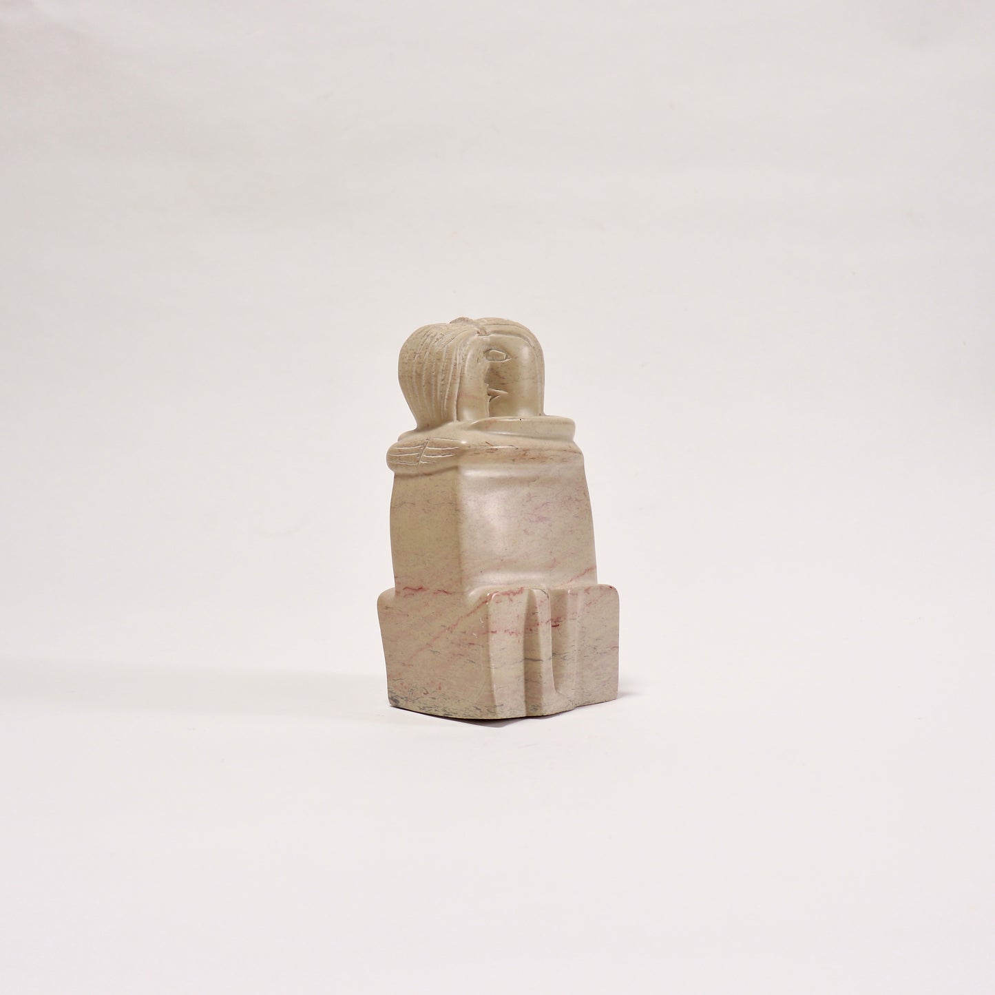 Vintage carved soapstone embracing figures sculpture