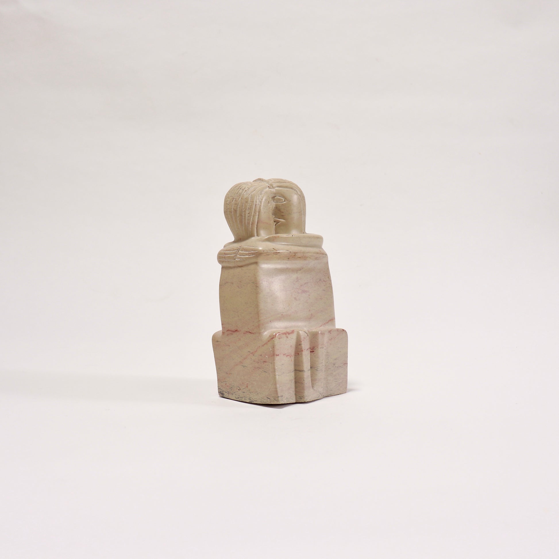 Vintage carved soapstone embracing figures sculpture