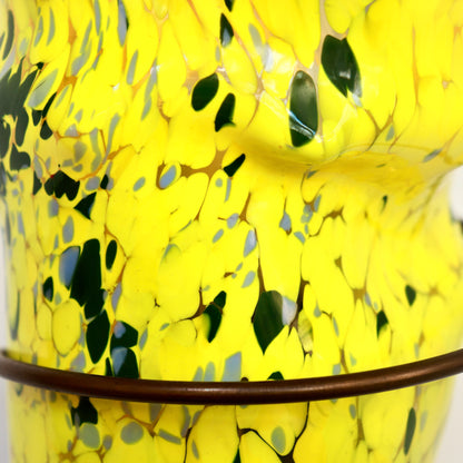 Close detail of green inclusions in Murano glass