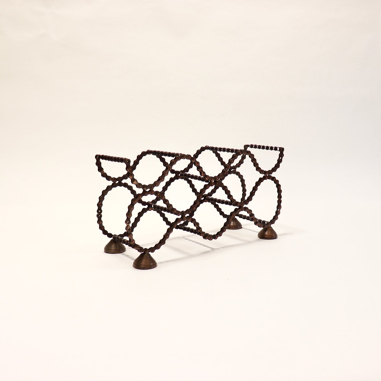 Sculptural wine rack made from recycled bike chain