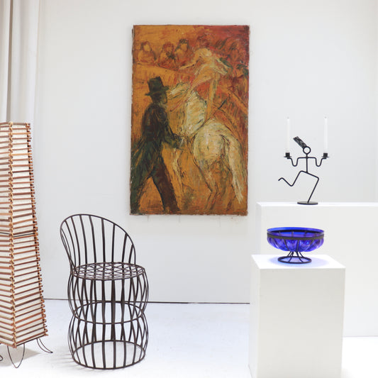 Large unframed oil painting styled in interior