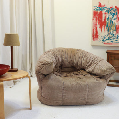 “Brigantin armchair styled in a living room setting.”