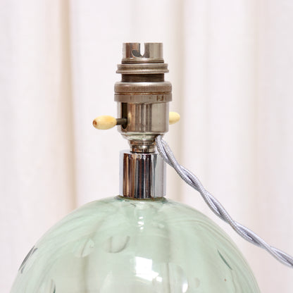 Pale green cut glass sphere table lamp without shade
