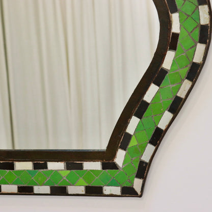 Side angle of Moorish mirror with iron edging