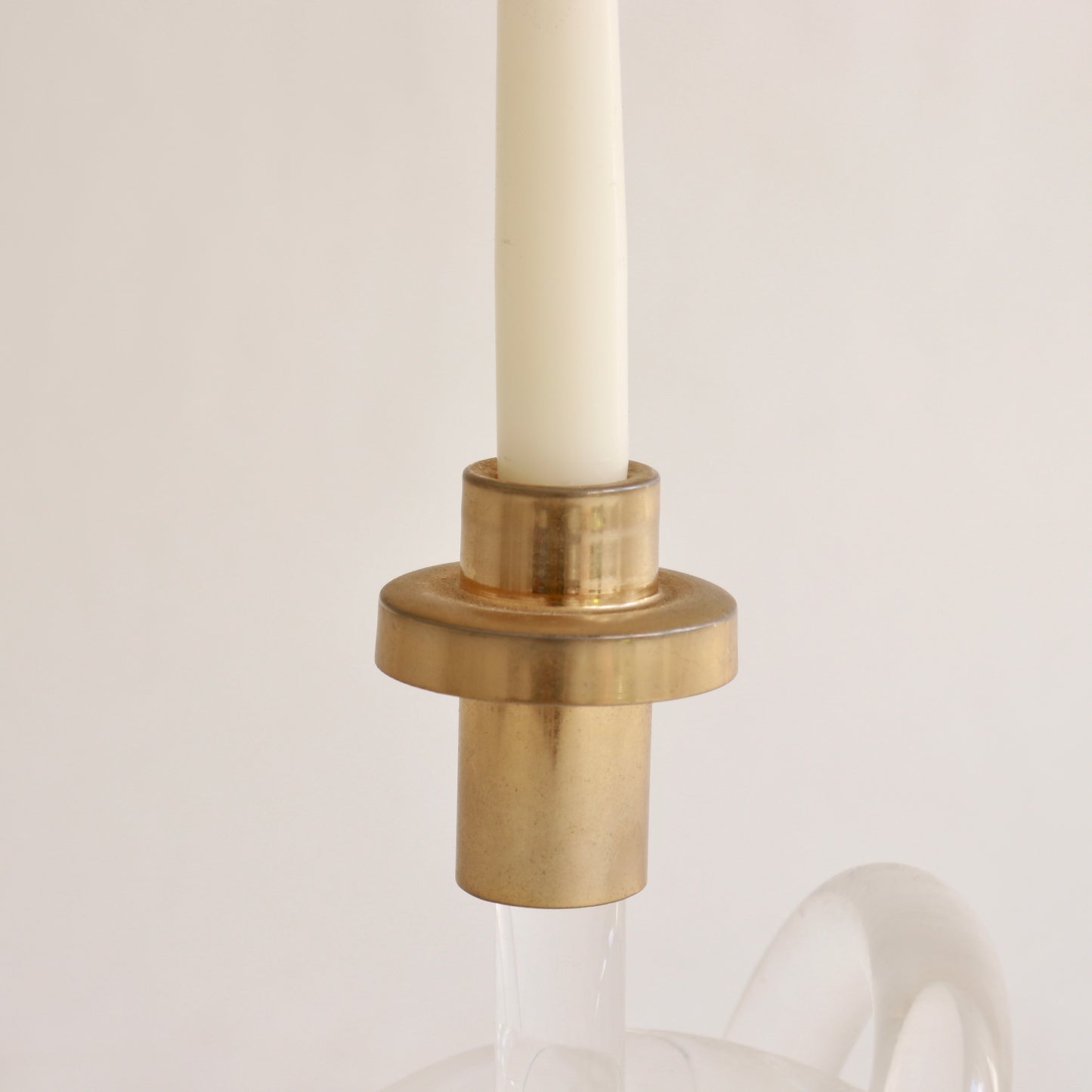 twisted lucite candlestick with brass detail