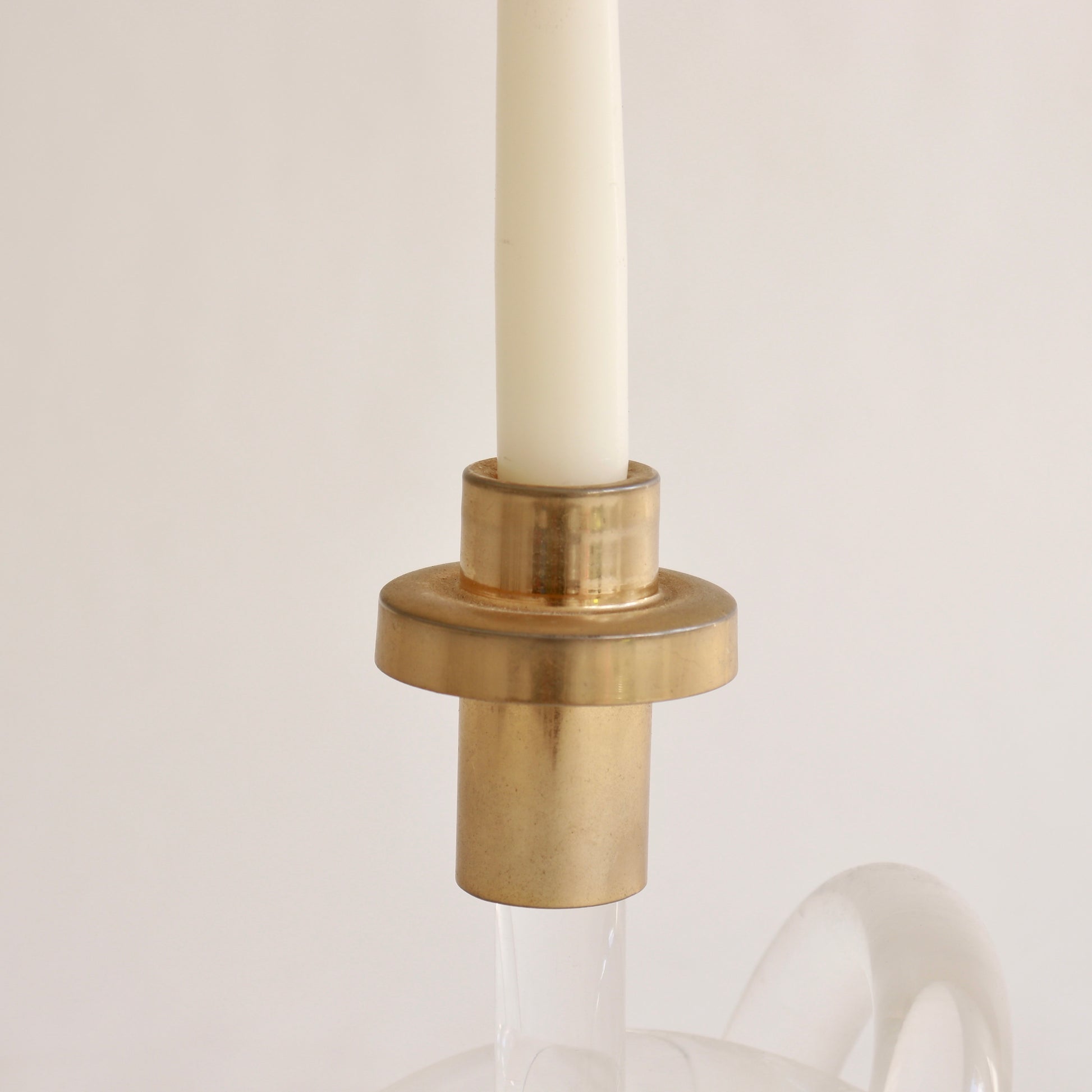 twisted lucite candlestick with brass detail
