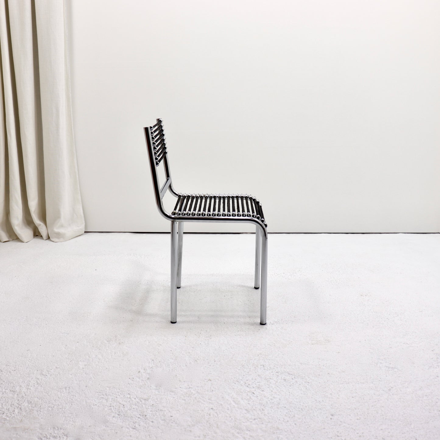 Sandow chair by Rene Herbst