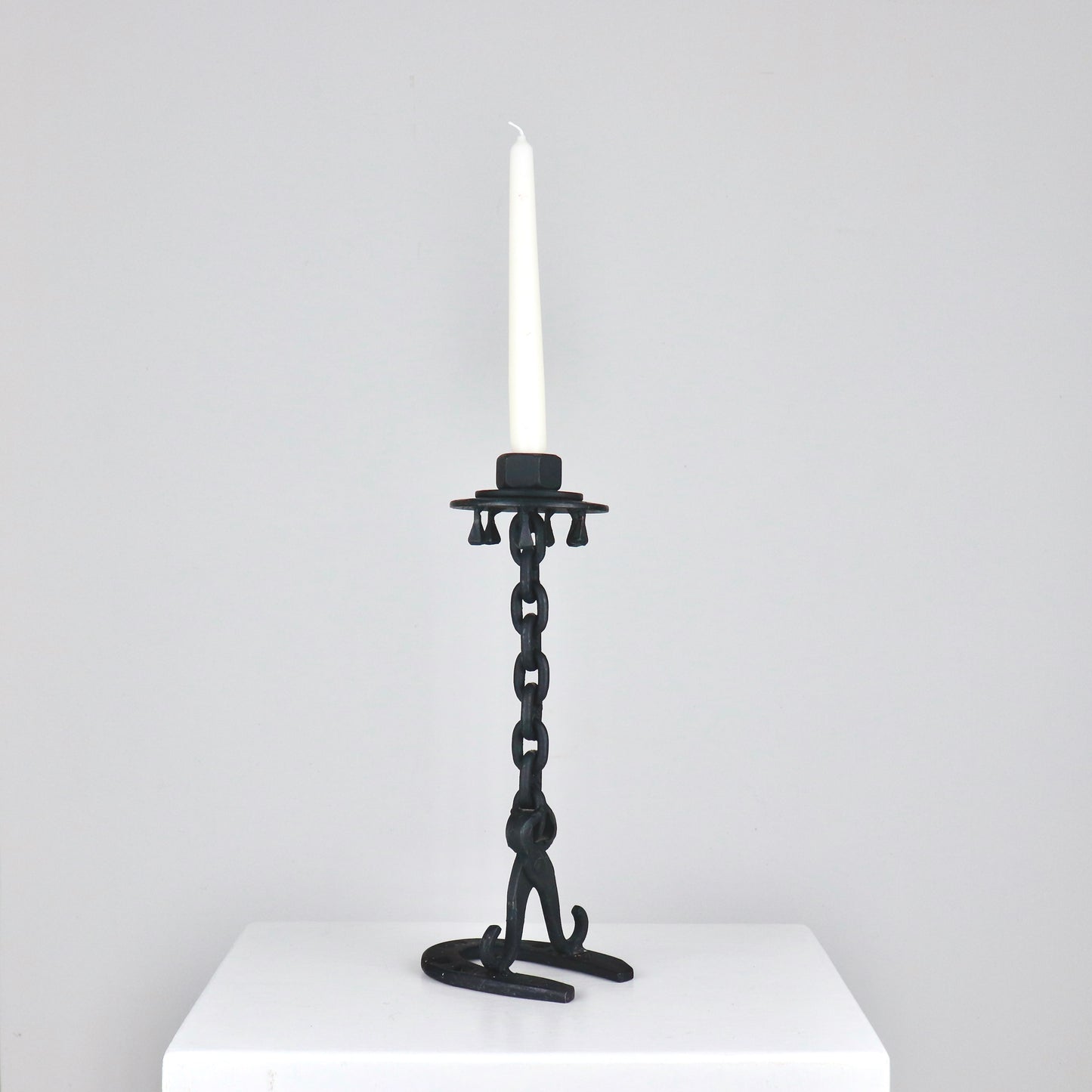 Blacksmith-made forged iron candlestick with chain link stem, height 31 cm